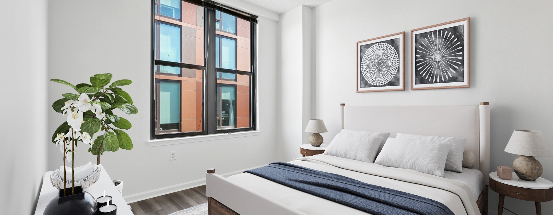spacious bedroom with natural light and large window