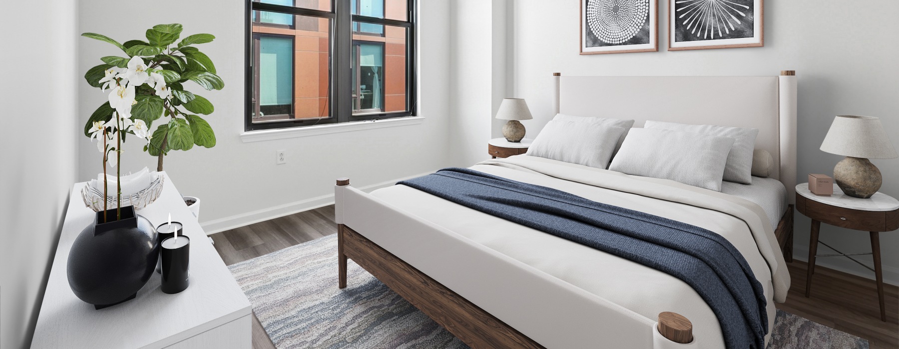 spacious bedroom with natural light and large window