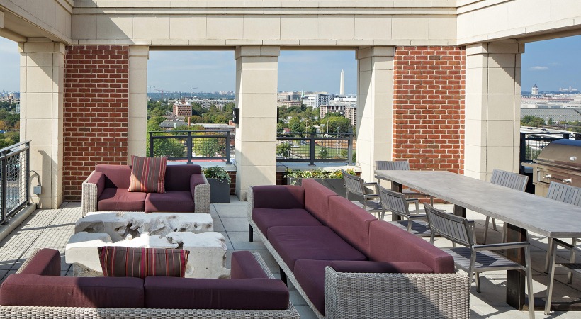 Monumental DC Views grills and social areas on rooftop terrace with city views